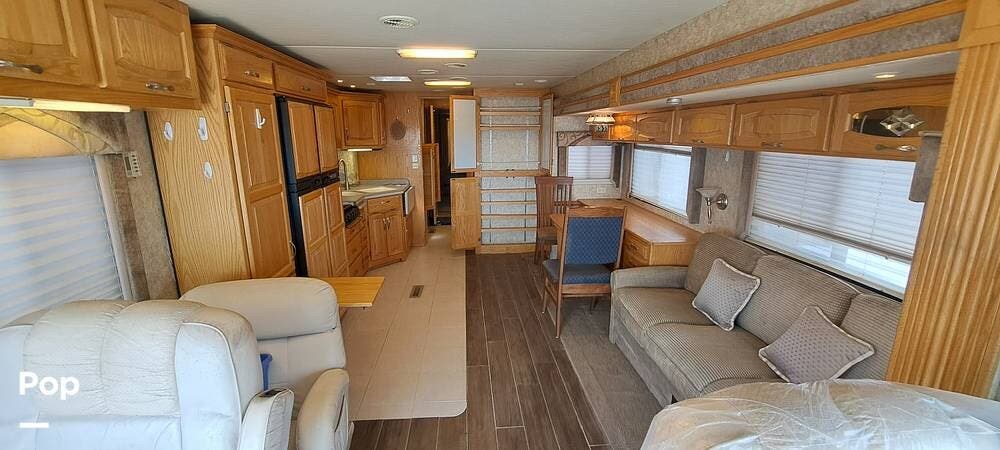 2005 Newmar Dutch Star 4024 - Used Diesel Pusher For Sale by Pop RVs in Brighton, Colorado features Generator, Slideout, Air Conditioning, Awning, Leveling Jacks
