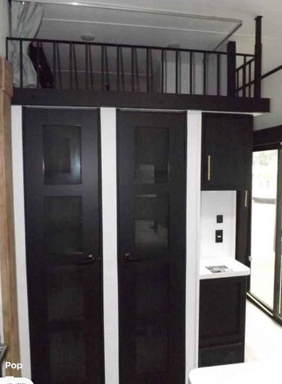 2023 Keystone Residence 40 FLFT - Used Travel Trailer For Sale by Pop RVs in Marion, Ohio features Slideout