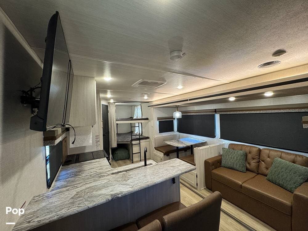 2024 Forest River Surveyor Legend 276BHLE - Used Travel Trailer For Sale by Pop RVs in Temecula, California features Leveling Jacks, Air Conditioning, Slideout, Awning
