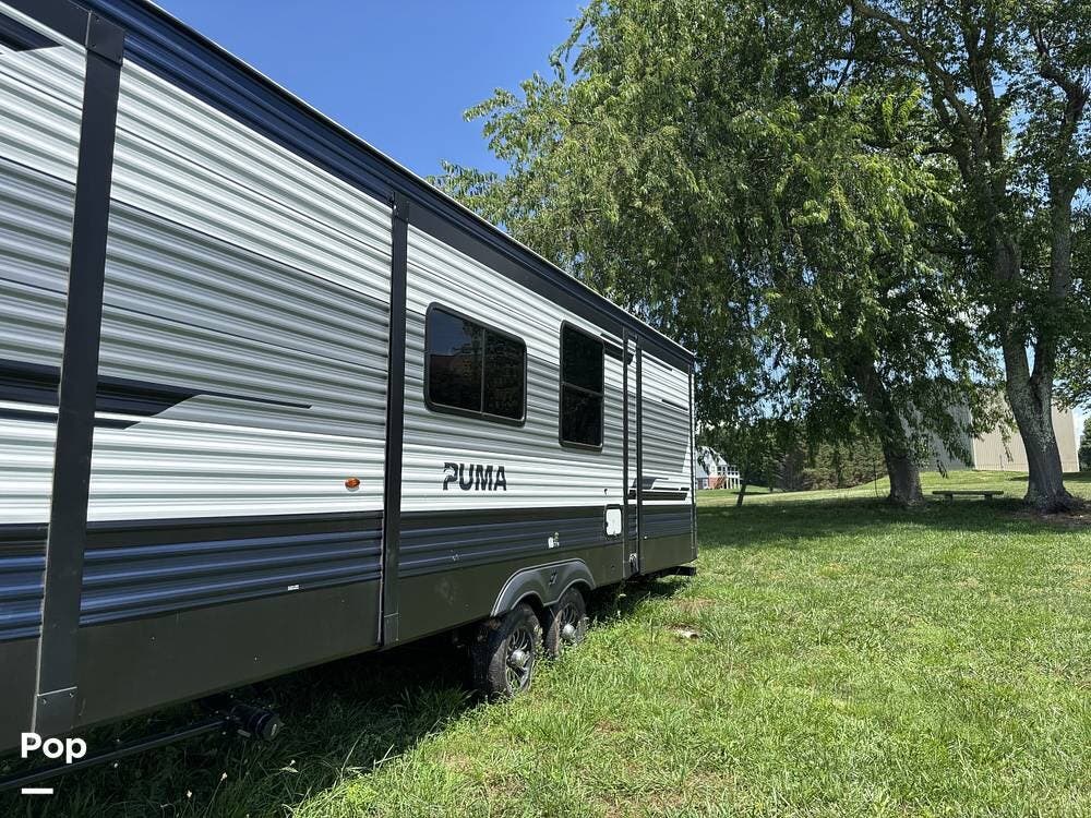 2026 Forest River Puma 32BHFS - Used Travel Trailer For Sale by Pop RVs in Jonesborough, Tennessee features Leveling Jacks, Slideout, Awning, Air Conditioning
