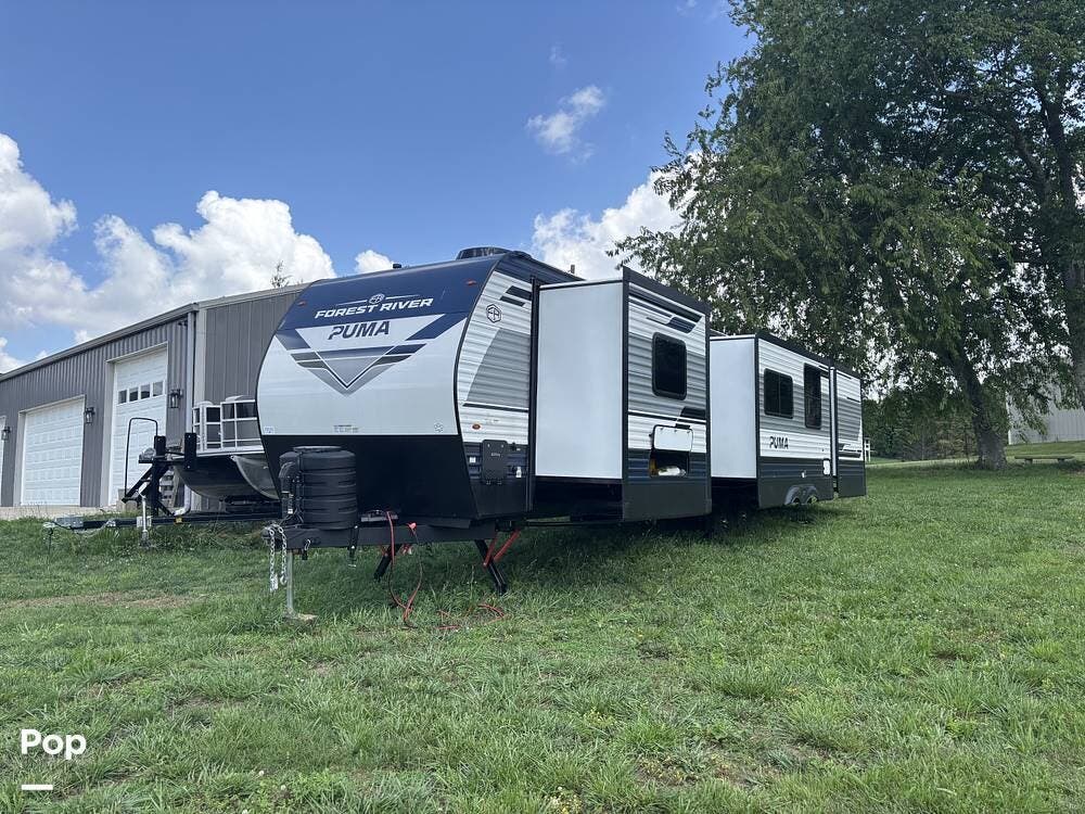 2026 Forest River Puma 32BHFS - Used Travel Trailer For Sale by Pop RVs in Jonesborough, Tennessee features Slideout, Air Conditioning, Leveling Jacks, Awning