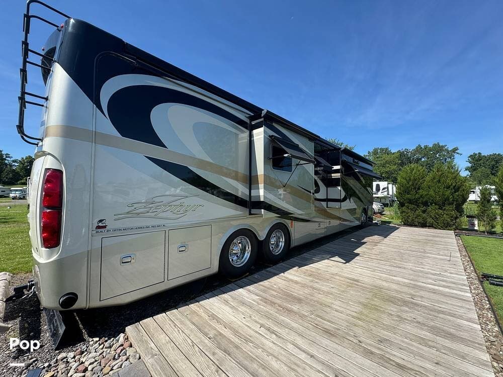 2011 Tiffin Zephyr 45QBZ - Used Diesel Pusher For Sale by Pop RVs in Newark, New York features Slideout, Leveling Jacks, Generator, Air Conditioning, Awning