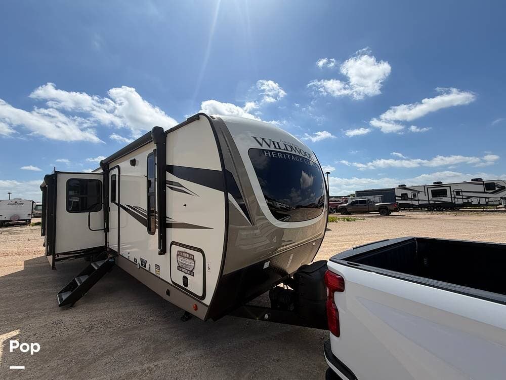 2023 Forest River Heritage Glen 310BHI - Used Travel Trailer For Sale by Pop RVs in Celina, Texas features Awning, Air Conditioning, Slideout, Leveling Jacks
