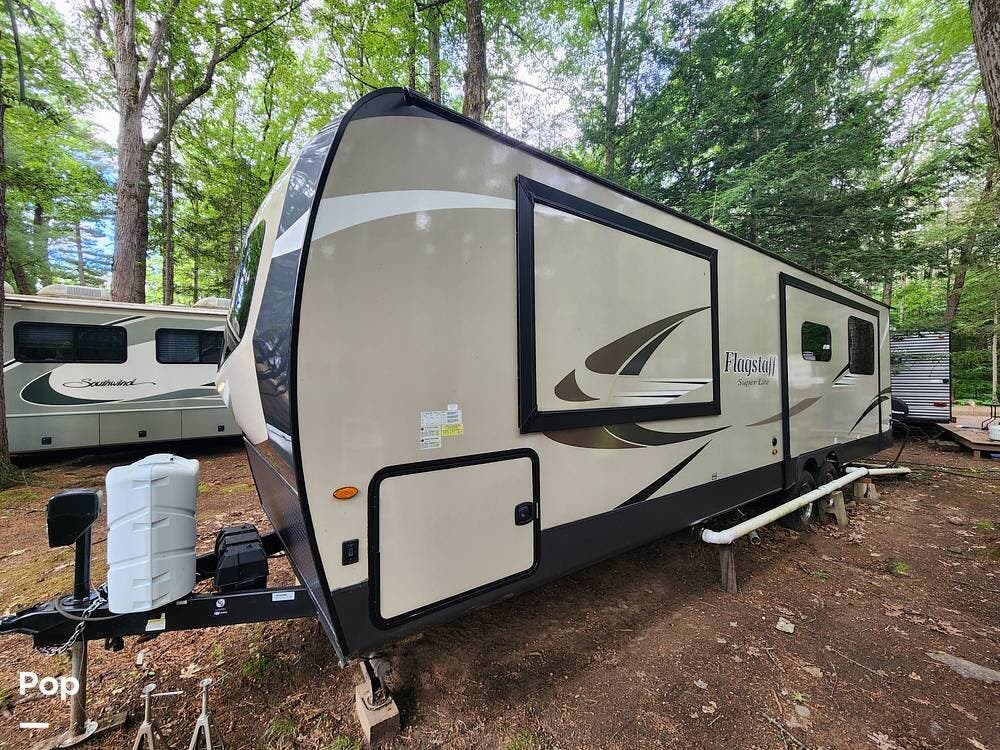 2019 Forest River Flagstaff 29RKWS - Used Travel Trailer For Sale by Pop RVs in Pennellville, New York features Slideout, Awning, Leveling Jacks, Air Conditioning