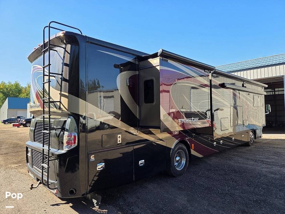 2015 Tiffin Phaeton 40AH - Used Diesel Pusher For Sale by Pop RVs in Hibbing, Minnesota features Generator, Leveling Jacks, Awning, Slideout, Air Conditioning