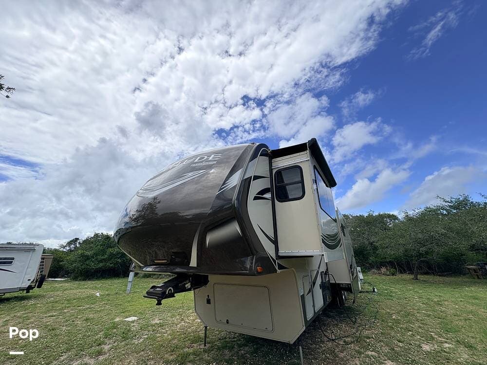 2015 Grand Design Solitude ST379FL - Used Fifth Wheel For Sale by Pop RVs in Rockport, Texas features Awning, Leveling Jacks, Air Conditioning, Slideout