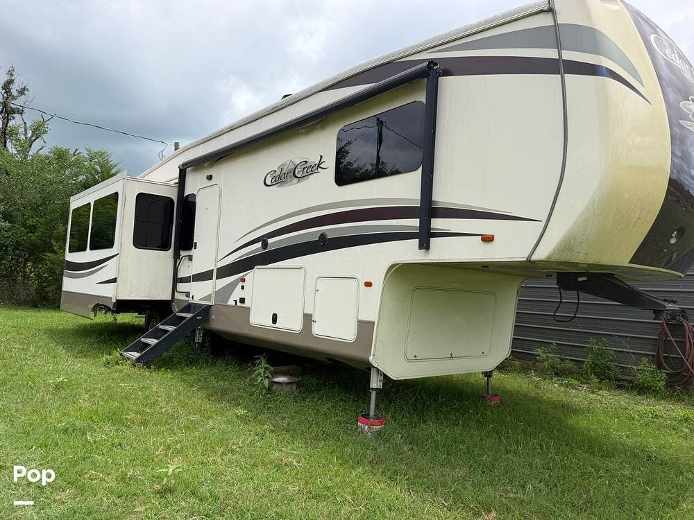 2017 Forest River Cedar Creek 36ck2 - Used Fifth Wheel For Sale by Pop RVs in Winnsboro, Texas features Air Conditioning, Slideout, Awning