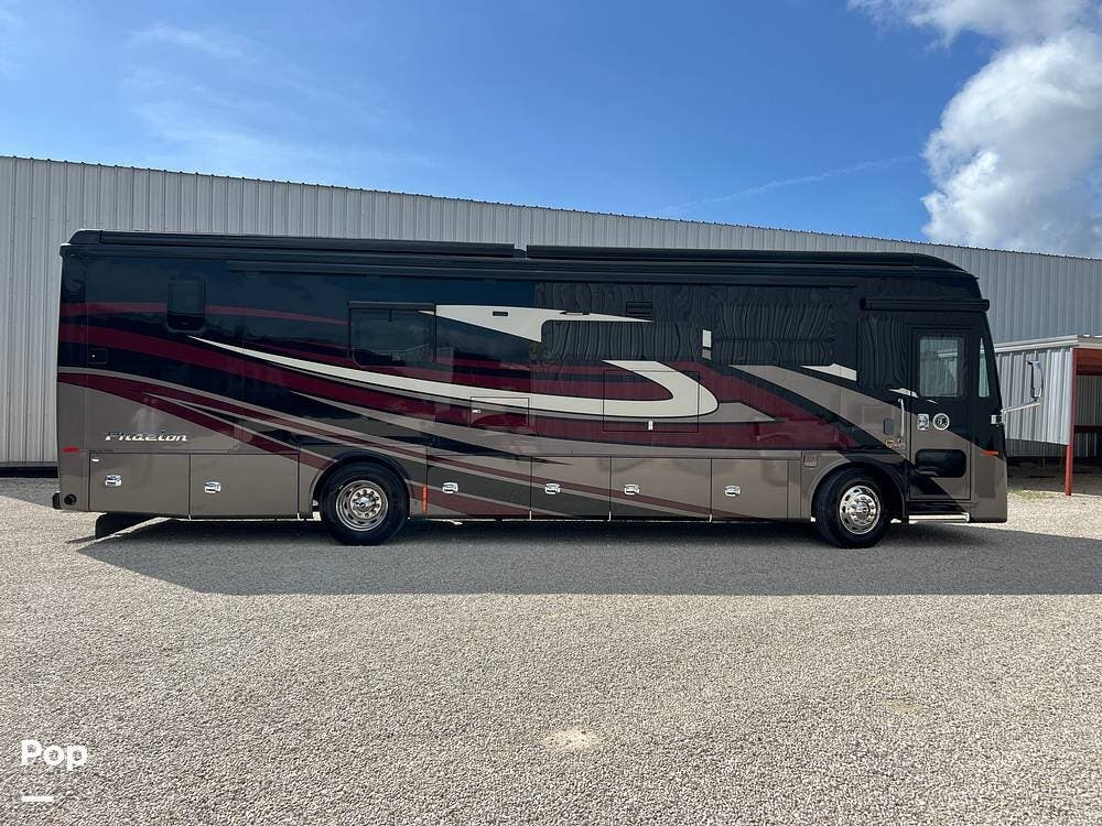 2023 Tiffin Phaeton 37BH - Used Diesel Pusher For Sale by Pop RVs in Georgetown, Texas features Leveling Jacks, Awning, Generator, Slideout, Air Conditioning