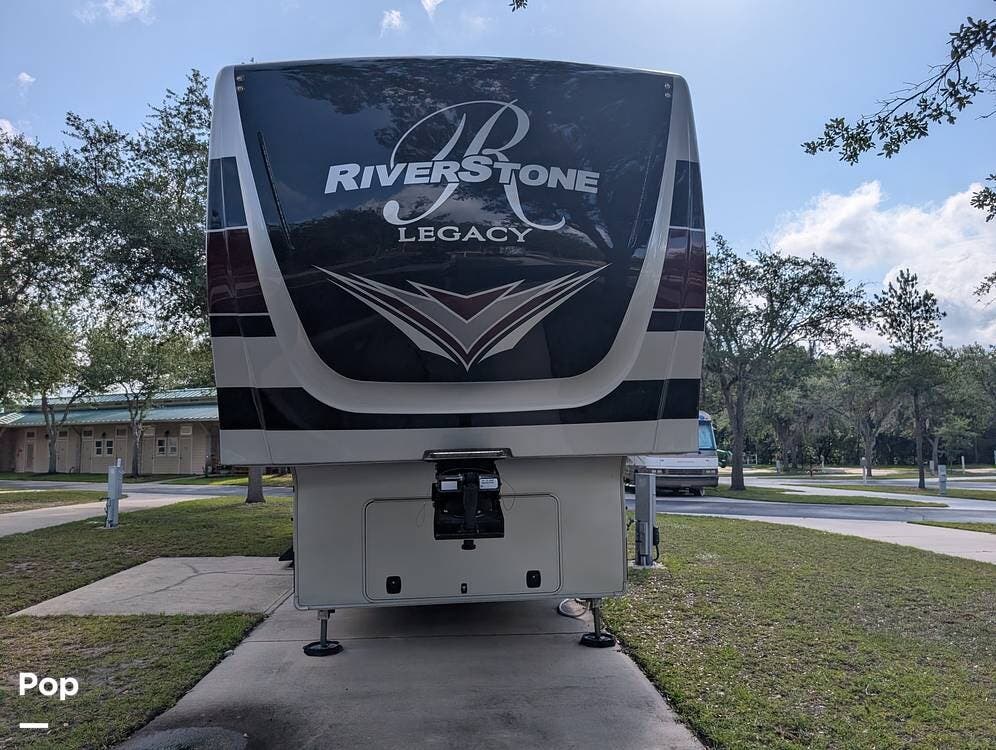 2022 Forest River RiverStone Legacy 39RKFB - Used Fifth Wheel For Sale by Pop RVs in Orlando, Florida features Slideout