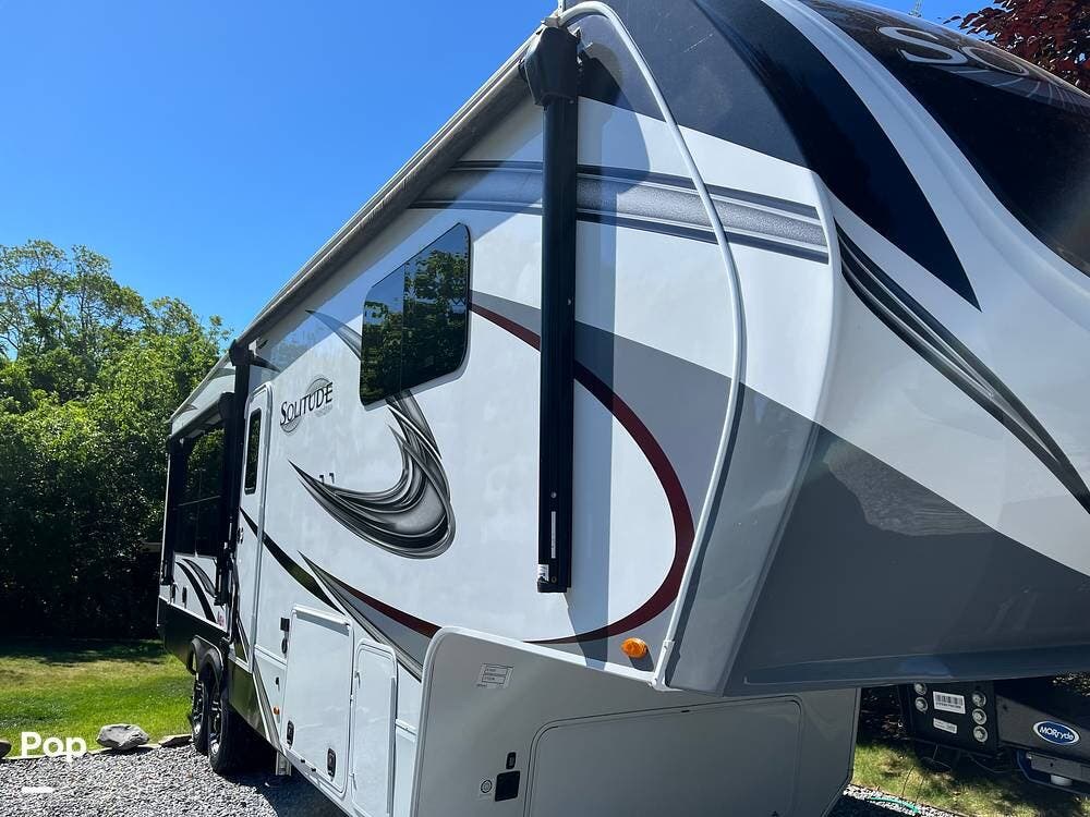 2023 Grand Design Solitude 310GK - Used Fifth Wheel For Sale by Pop RVs in Eastport, New York features Air Conditioning, Awning, Leveling Jacks, Slideout