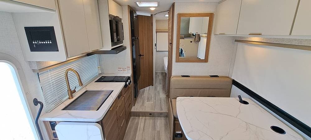 2027 Thor Motor Coach Four Winds 22Z - Used Class C For Sale by Pop RVs in Aurora, Colorado features Generator, Air Conditioning, Awning, Slideout