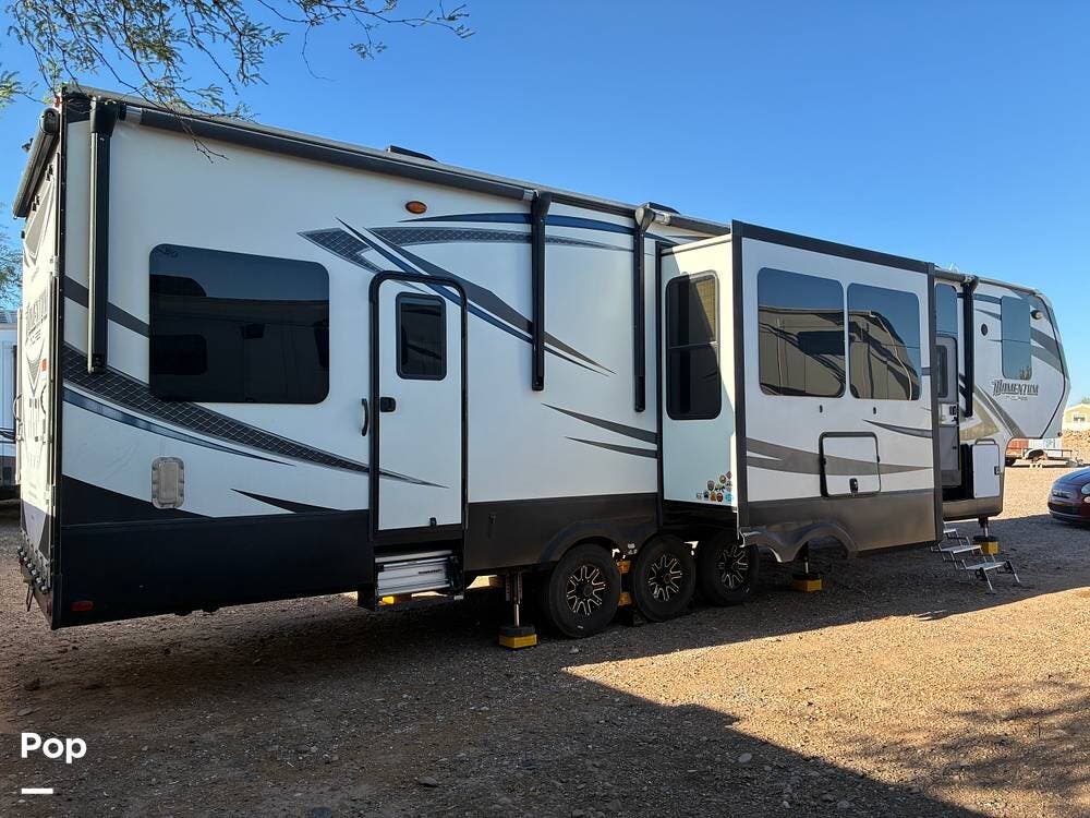 2015 Grand Design Momentum 388M - Used Toy Hauler For Sale by Pop RVs in Casa Grande, Arizona features Awning, Air Conditioning, Slideout, Generator, Leveling Jacks