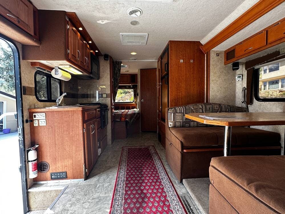 2008 Bigfoot 30MH26SL w True 4x4 & Lift - Used Class C For Sale by Pop RVs in Boulder, Colorado features Air Conditioning, Awning, Slideout, Generator