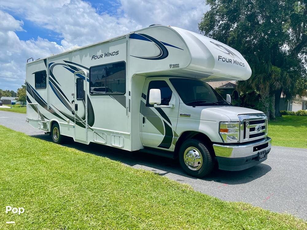 2021 Thor Motor Coach Four Winds 28Z - Used Class C For Sale by Pop RVs in Sebastian, Florida features Slideout, Awning, Air Conditioning, Generator