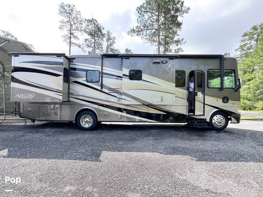 2013 Tiffin Allegro 34 TGA - Used Class A For Sale by Pop RVs in Freeport, Florida features Generator, Slideout, Leveling Jacks, Awning, Air Conditioning
