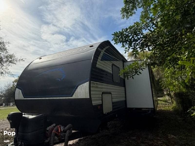 2023 Heartland Prowler 320BH - Used Travel Trailer For Sale by Pop RVs in Fort Myers, Florida features Slideout, Air Conditioning, Leveling Jacks