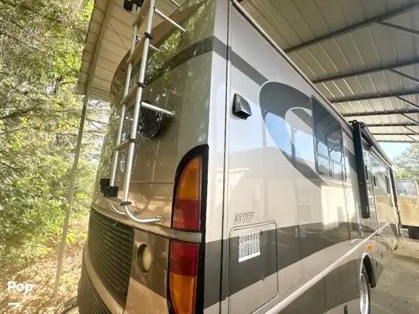 2005 Fleetwood Discovery 39S - Used Diesel Pusher For Sale by Pop RVs in Phenix City, Alabama features Slideout, Air Conditioning, Leveling Jacks, Awning, Generator