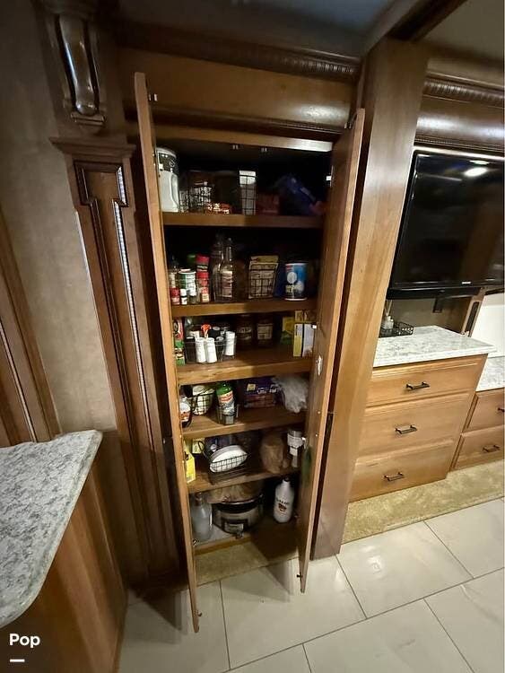 2015 Entegra Coach Cornerstone 45B - Used Diesel Pusher For Sale by Pop RVs in Bells, Texas features Slideout, Awning, Air Conditioning, Generator