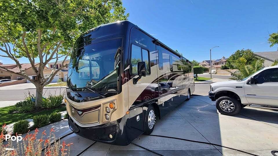 2015 Fleetwood Excursion 35E - Used Diesel Pusher For Sale by Pop RVs in Lancaster, California features Awning, Leveling Jacks, Slideout, Air Conditioning, Generator