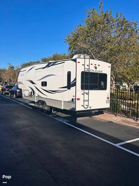 2021 Keystone Cougar M315 - Used Travel Trailer For Sale by Pop RVs in Miami, Florida features Slideout