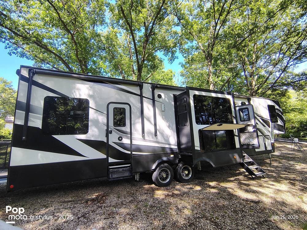 2021 Dutchmen Voltage 3845 - Used Toy Hauler For Sale by Pop RVs in Lawton, Michigan features Leveling Jacks, Air Conditioning, Awning, Slideout, Generator