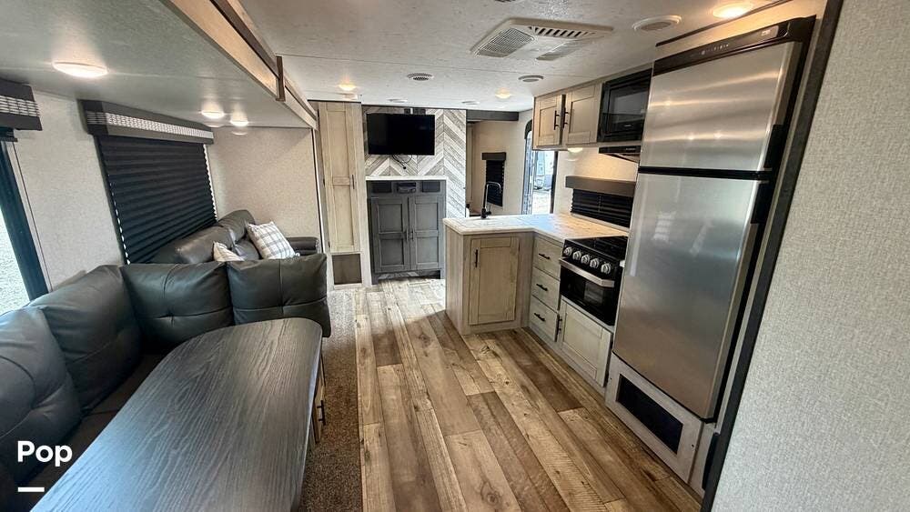 2021 K-Z Connect 312BHKSE - Used Travel Trailer For Sale by Pop RVs in Tomball, Texas features Awning, Leveling Jacks, Slideout, Air Conditioning