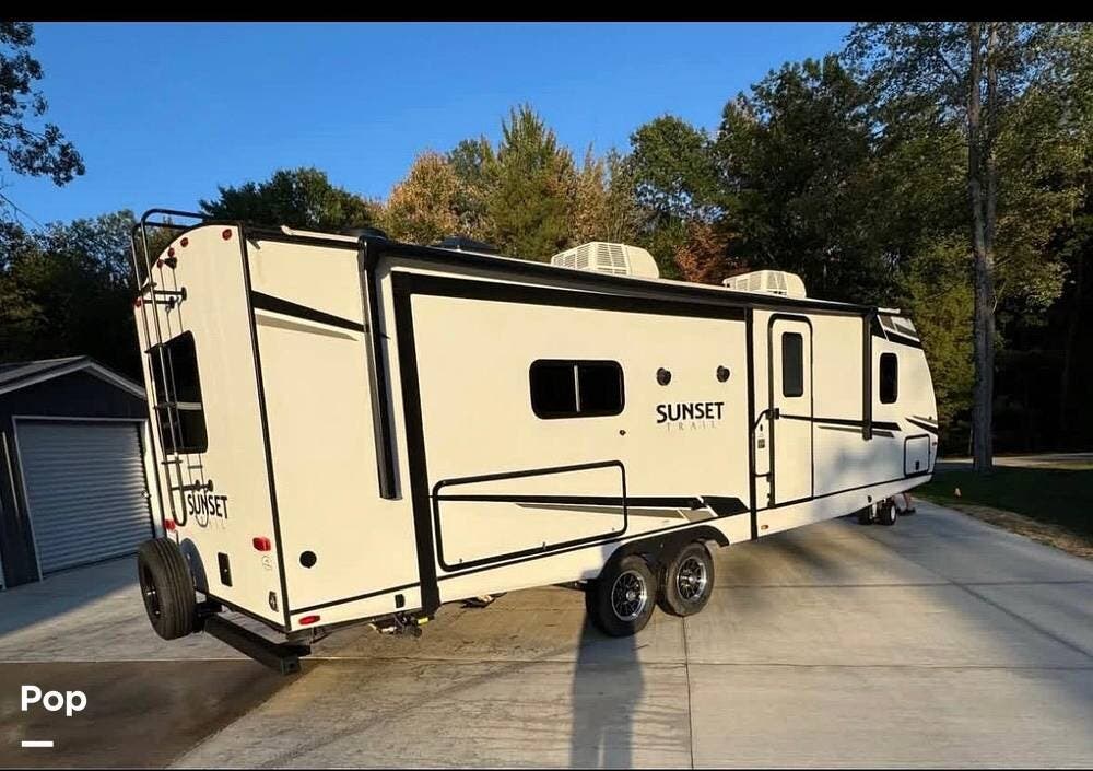 2024 CrossRoads Sunset Trail 285CK - Used Travel Trailer For Sale by Pop RVs in Clio, Michigan features Slideout