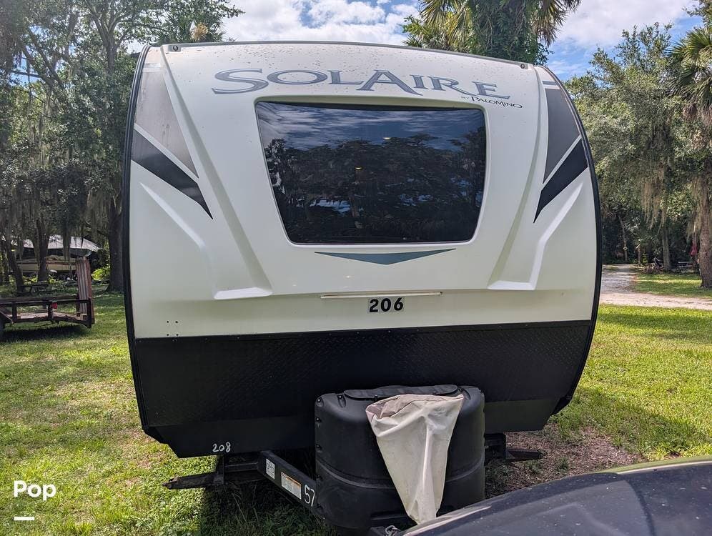 2022 Palomino Solaire 208SS - Used Travel Trailer For Sale by Pop RVs in New Smyrna Beach, Florida features Air Conditioning, Slideout, Leveling Jacks, Awning
