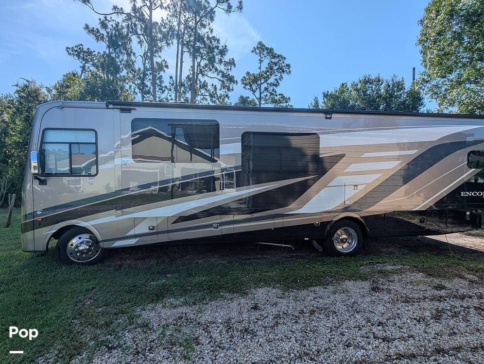 2024 Coachmen Encore 325SS - Used Class A For Sale by Pop RVs in Port Charlotte, Florida features Generator, Awning, Slideout, Leveling Jacks, Air Conditioning