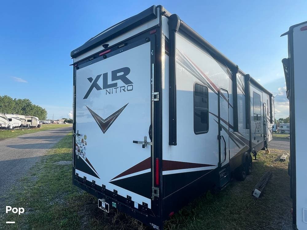 2022 Forest River XLR Nitro 35DK5 - Used Toy Hauler For Sale by Pop RVs in Warren, Michigan features Awning, Slideout, Generator, Air Conditioning