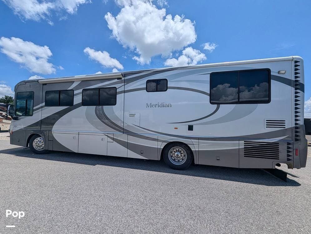 2009 Itasca Meridian 37H - Used Diesel Pusher For Sale by Pop RVs in Rotonda West, Florida features Awning, Air Conditioning, Leveling Jacks, Slideout, Generator