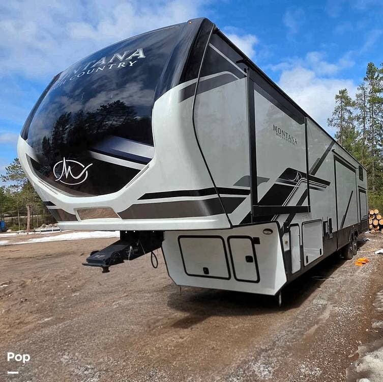 2024 Keystone Montana High Country 381TB - Used Fifth Wheel For Sale by Pop RVs in Iron Mountain, Michigan features Leveling Jacks, Awning, Air Conditioning, Slideout
