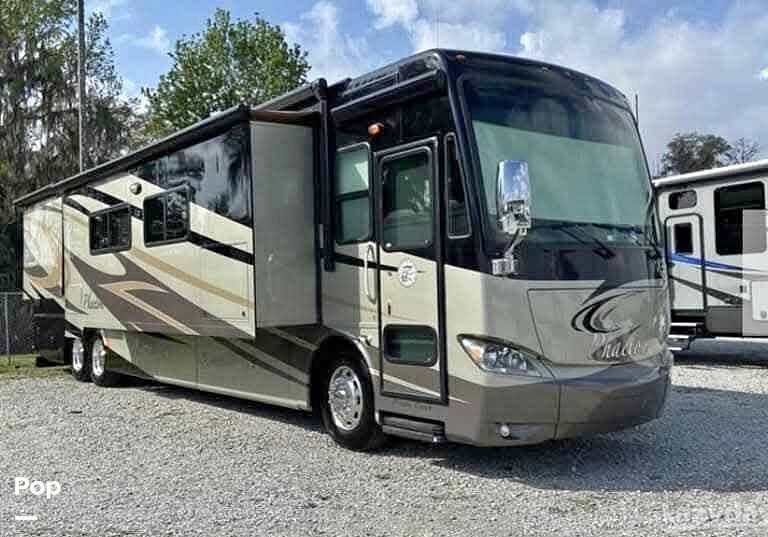 2012 Tiffin Phaeton 42LH - Used Diesel Pusher For Sale by Pop RVs in Brooksville, Florida features Slideout