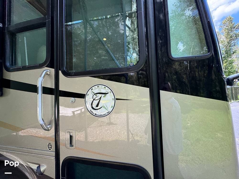 2012 Tiffin Phaeton 42LH - Used Diesel Pusher For Sale by Pop RVs in Brooksville, Florida features Air Conditioning, Generator, Awning, Leveling Jacks, Slideout