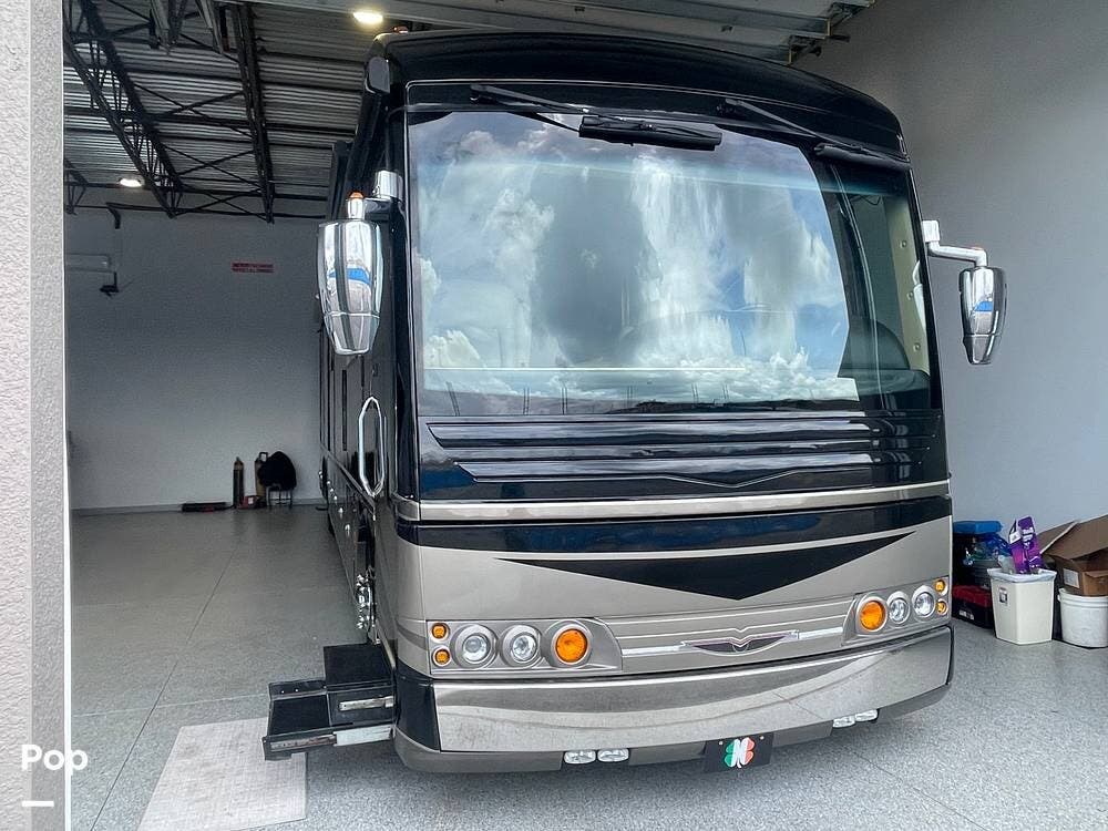 2007 American Coach American Heritage 45E - Used Class B For Sale by Pop RVs in Ft Myers, Florida features Generator, Leveling Jacks, Slideout, Awning, Air Conditioning