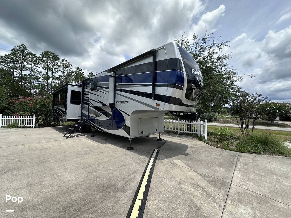 2022 Forest River RiverStone Legacy 39RKFB - Used Fifth Wheel For Sale by Pop RVs in Southport, North Carolina features Air Conditioning, Generator, Awning, Slideout, Leveling Jacks