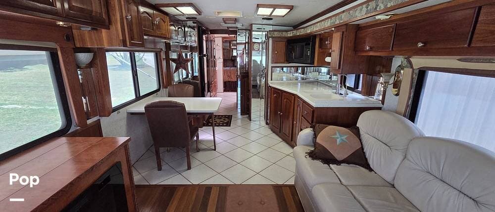 2000 Tiffin Zephyr 42 - Used Diesel Pusher For Sale by Pop RVs in Whitney, Texas features Leveling Jacks, Generator, Air Conditioning, Awning, Slideout