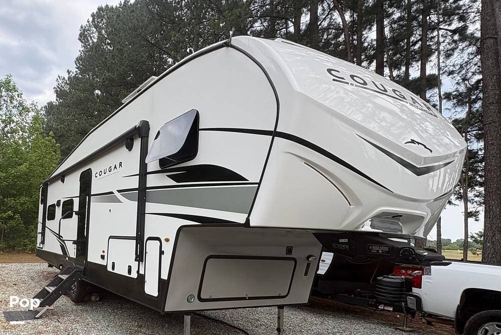 2024 Keystone Cougar Sport 2700BH - Used Travel Trailer For Sale by Pop RVs in Burlington, North Carolina features Slideout