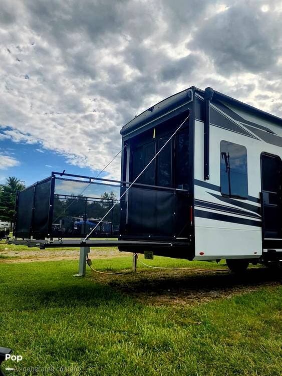 2024 Grand Design Momentum 395MS - Used Toy Hauler For Sale by Pop RVs in Howell, Michigan features Slideout