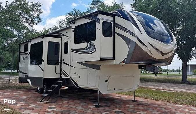 2021 Grand Design Solitude 380FL - Used Fifth Wheel For Sale by Pop RVs in Fairport, New York features Slideout