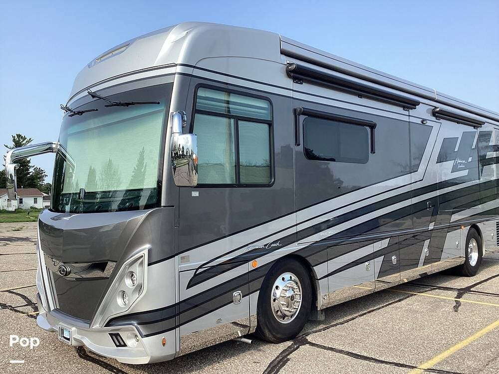 2023 American Coach American Tradition 37S - Used Diesel Pusher For Sale by Pop RVs in Le Sueur, Minnesota features Air Conditioning, Leveling Jacks, Generator, Awning, Slideout