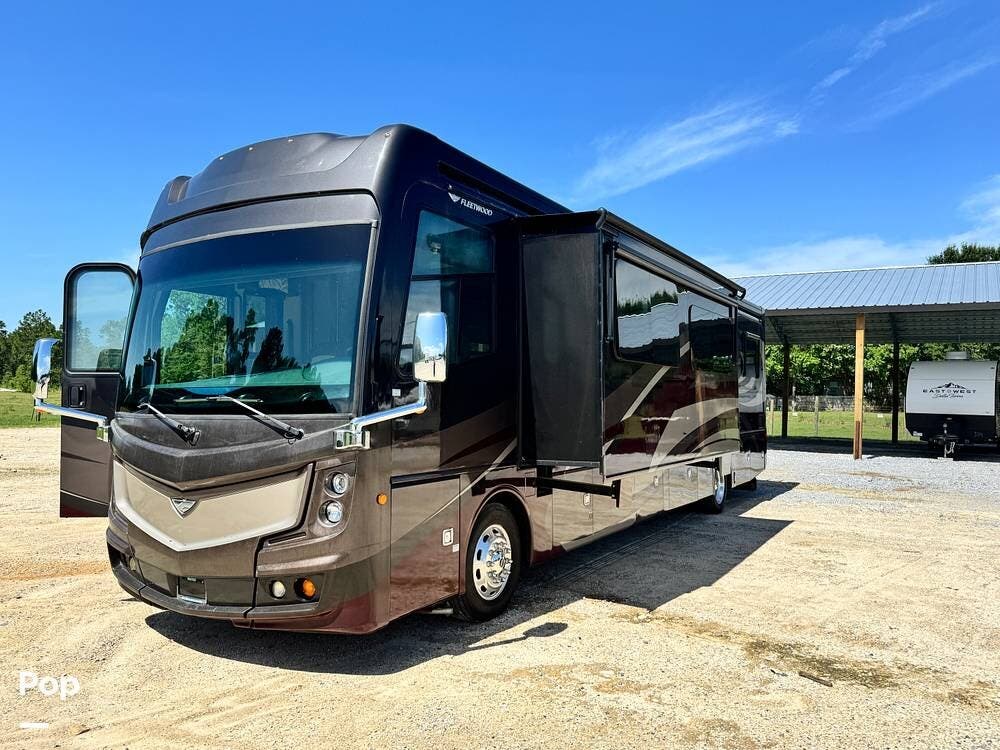 2017 Fleetwood Discovery LXE 40X - Used Diesel Pusher For Sale by Pop RVs in Gulfport, Mississippi features Air Conditioning, Generator, Leveling Jacks, Awning, Slideout