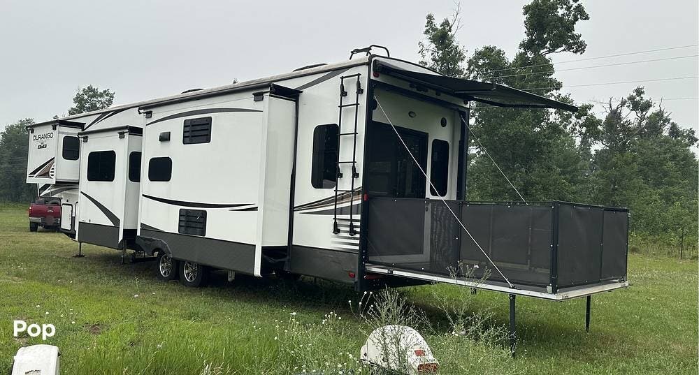 2021 K-Z Durango Gold 382MBQ - Used Fifth Wheel For Sale by Pop RVs in Hillman, Michigan features Leveling Jacks, Awning, Air Conditioning, Slideout, Generator