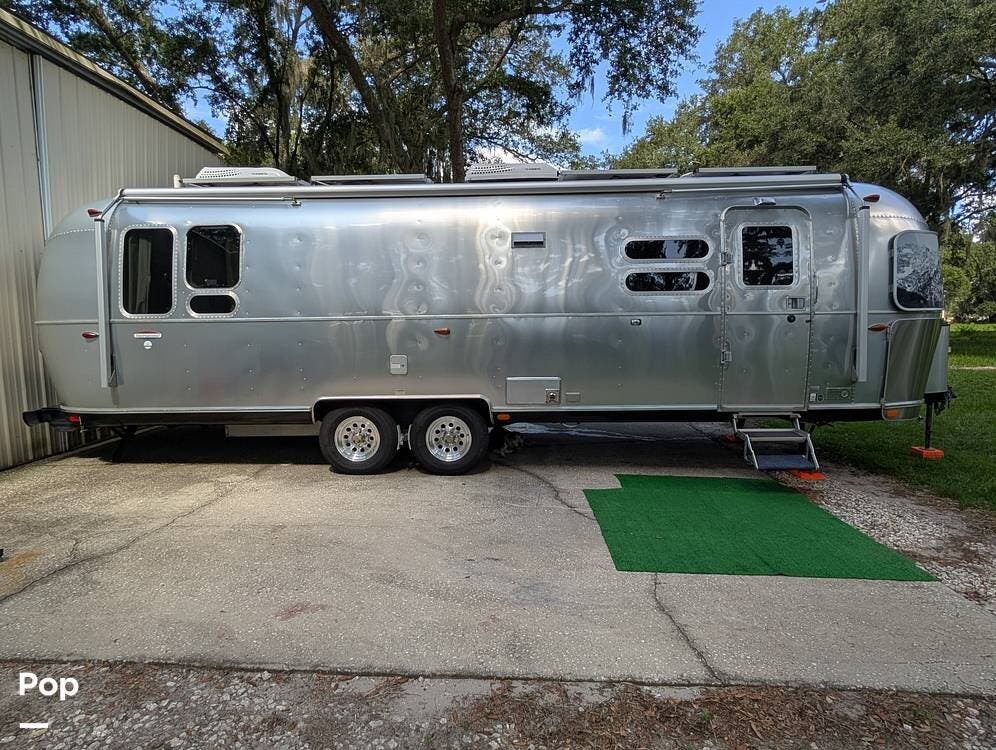 2017 Airstream International Serenity 30RB - Used Travel Trailer For Sale by Pop RVs in Deland, Florida features Leveling Jacks, Air Conditioning, Awning