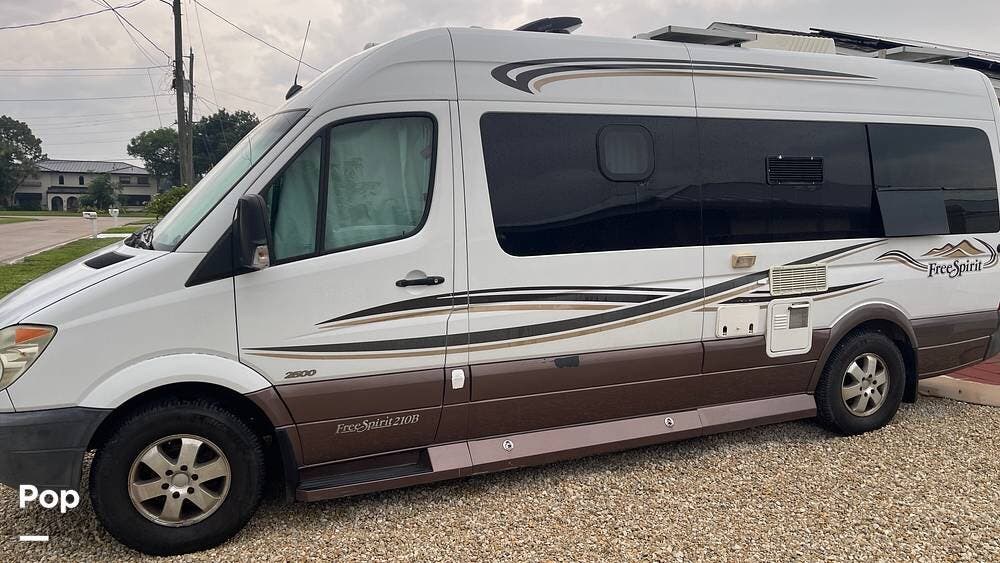 2008 Leisure Travel Free Spirit 210B - Used Class B For Sale by Pop RVs in North Fort Myers, Florida features Awning, Air Conditioning, Generator