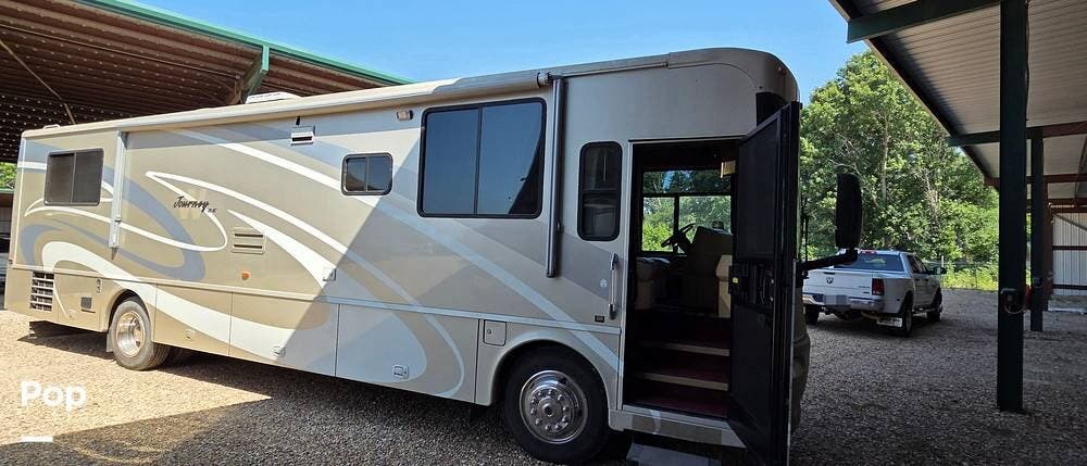 2006 Winnebago Journey 36G - Used Diesel Pusher For Sale by Pop RVs in Melissa, Texas features Awning, Slideout, Leveling Jacks, Generator, Air Conditioning