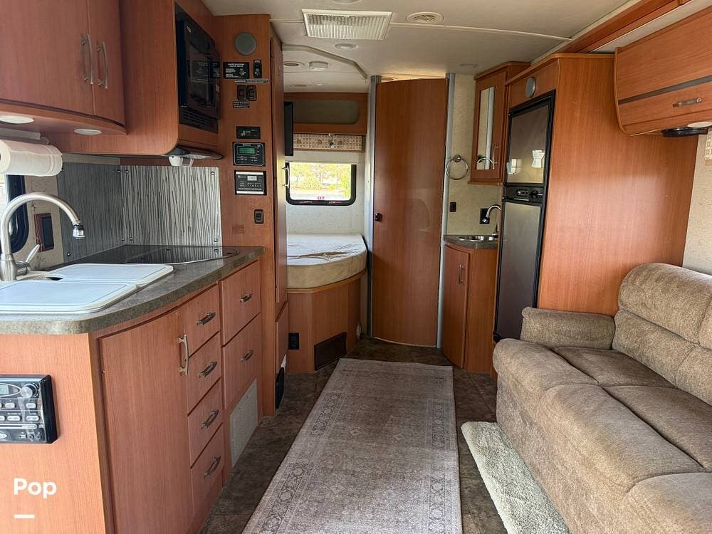 2013 Winnebago View 24J - Used Class C For Sale by Pop RVs in Las Vegas, Nevada features Awning, Slideout, Generator, Leveling Jacks, Air Conditioning