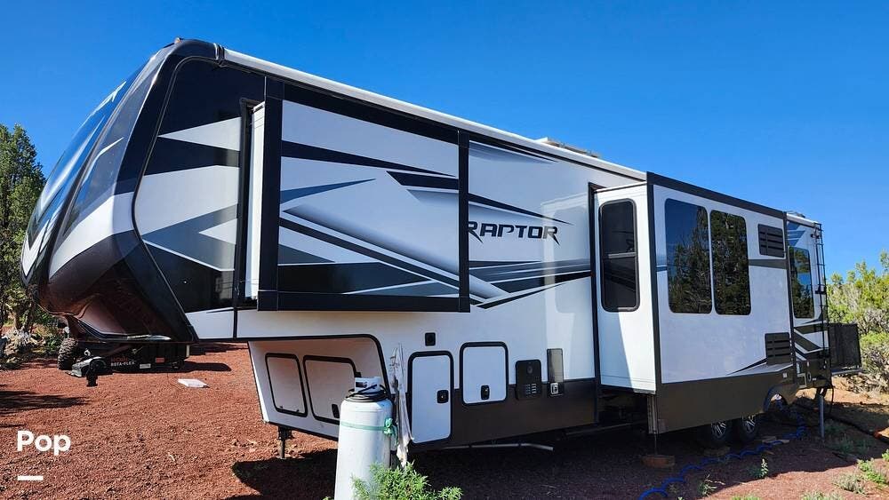 2022 Keystone Raptor 351 - Used Toy Hauler For Sale by Pop RVs in Williams, Arizona features Slideout, Air Conditioning, Generator, Awning, Leveling Jacks