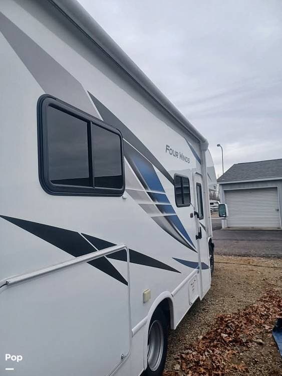 2024 Thor Motor Coach Four Winds 22E - Used Class C For Sale by Pop RVs in Portage, Michigan features Awning, Leveling Jacks, Generator, Air Conditioning
