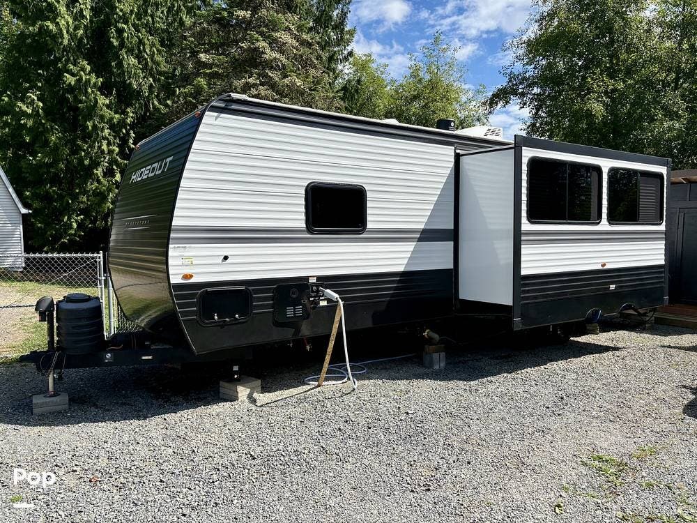 2025 Keystone Hideout Sport 291BR - Used Travel Trailer For Sale by Pop RVs in Snohomish, Washington features Slideout, Awning, Air Conditioning